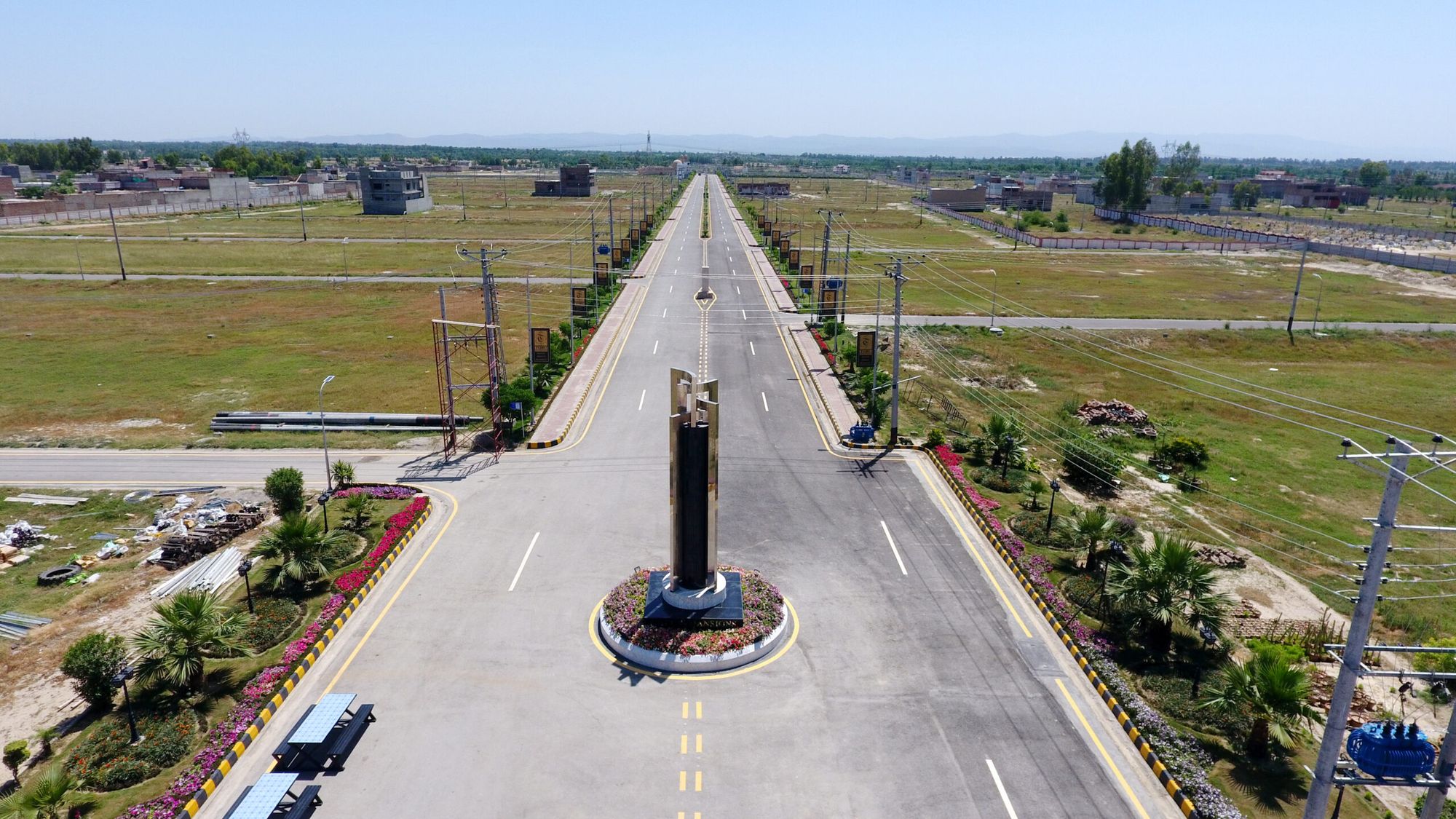 Aerial view of the Green Mansions main boulevard and monument