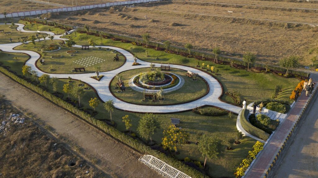 Aerial view of a landscaped park with winding paths